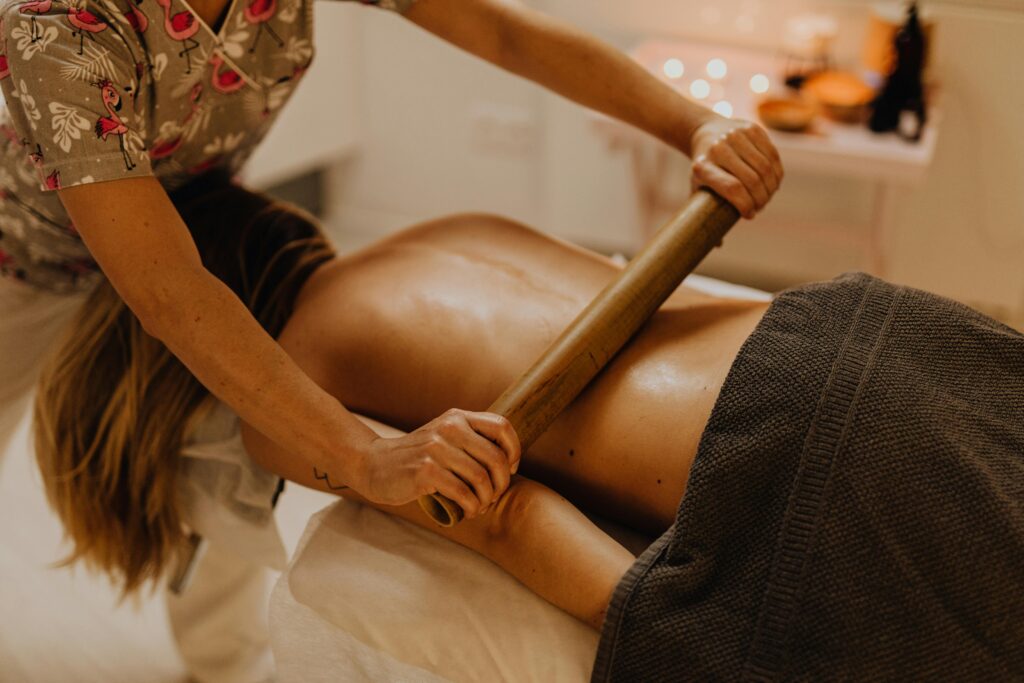 Experience a soothing bamboo massage in a serene spa setting for ultimate relaxation.